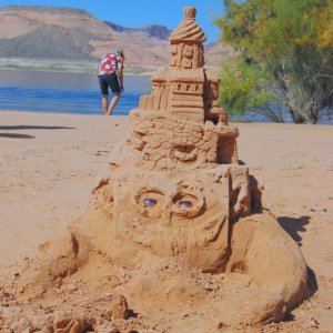 Sand sculpture found on beach.
