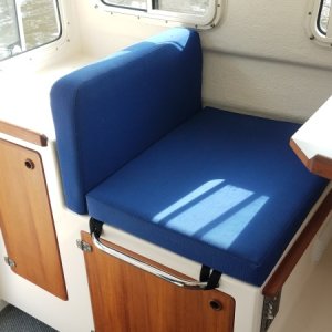 Cargo straps barely noticeable under the cushions when not in use.