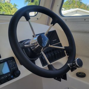 New padded wheel with steering knob.
Game changer!