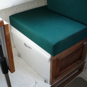Most of the seat was recycled from the original seat box. Front, side and bottom panels were added along with the floor/deck. All painted to match.
