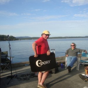 Tim Schmidt wins a rare
C-Dory floor mat