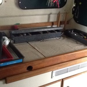 Cover over sink and stove. Perfect work area while fishing