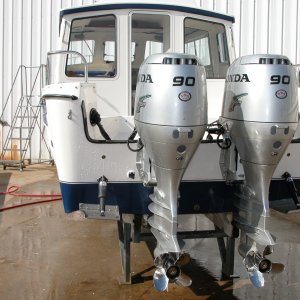4 blade 15" pitch SS Honda props.
