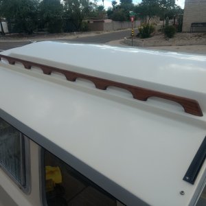 Got the cabin top buffed out and the hand rails back on.