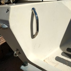 I had added this grab handle to the port, swim ladder, side awhile back and then clamped a rod holder to it. Not ideal if your wanting to actually use it as a grab handle.