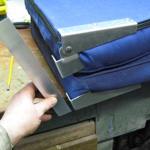 Media 'Lay seat flat and make measurement for angle aluminum.I was only able to get 16th inch so double up.' in album 'Get under the staples with screwdriver then pull with pliers.'