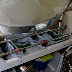 Another view of transom bar storage. Folding coleman chair fits over porta potti to save space.