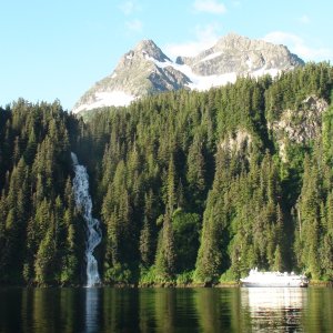 National Geographic ship "Seabird" near Red Bluff Bay waterfall