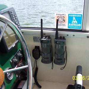 Media 'I have 2 hand held radio's and have mounted the charging brackets in the helm next to the on board vhf radio mic.  They are wired in to stay charged' in album 'I have 2 hand held radio's and have mounted the charging brackets in the helm next to the on board vhf radio mic.  They are wired in to stay charged'