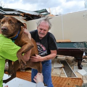 A Man Reunites With His Dog After The Alabama Tornado 2
