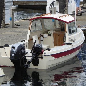 Say that's a handsome looking fishing boat. Too bad he don't fish!