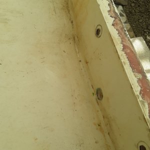 old center drain hole filled in.  not the low point on the sump is not lined up with the drain