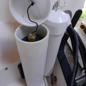 Media 'The large one fits two 1lb propane bottles' in album 'Two fuel canister "lockers" one large, one small. A keeper line is attached to each lid to keep it from going overboard.'