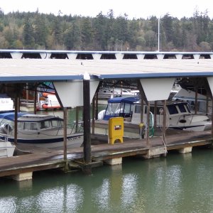 A Tomcat and a 22 in moorage at LaConner - C-Brats?