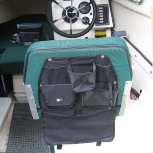 Case Logic seat back caddy under $20. Installed one on each seat.