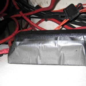 Bus bar covered by shield and duct tape