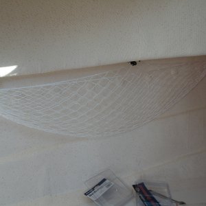 Hamock net with mid support from railing bolt in cabin