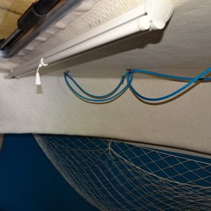 Note pull across shade for forward hatch.  no see-em insect screen velcro to the hatch rim, bungee cords for overhead storage of eagle pack cubes