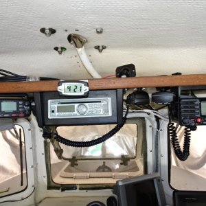 Radios and stereo on bottom of shelf.  Extra cigarette lighter plug for power to i pod, or other device.