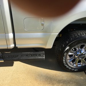 Running board extends all of the way to aft fender, and one can also put a foot on top of the tire if necessary when fueling aux tank.