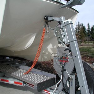 Orange chain installed after the Kingfisher II incident. More recently, added a chain binder to keep chain taut.
Hopefully it would keep boat from flying forward in a frontal accident.
