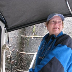 Pat, happy at work using Terry Meyers technique. "Beats the heck out of climbing on the bow" she said.