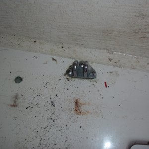 This gets through bolted into floor to keep chair from coming up in heavy seas