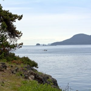Looking towards Cypress Island, a C-Dory Classic 22 passing in the foreground