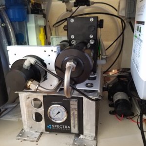 Almost finished, the flowmeter and pressure gauge were hard to find a convenient spot for. In the background you can see the copper foil that is the caries the ground plane from the SSB transceiver antenna tuner to the through hulls under the step where it is well bonded.