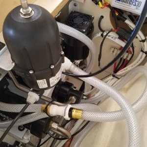 This pressure accumulator smooths out the pump pressure pulses. Below it is the quick disconnect on the on the hose that goes to the discharge through hull that will be connected to a circulation hose for storage chemicals that stop algae growth during storage. You can also see a bit of the 8 gauge duplex wire I had to install between the batteries and a close by sub fuse block.