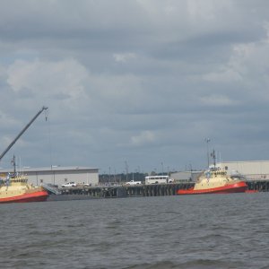 IMG 0470  There were 4 of these super clean tugs to move the subs.  Note sub at dock behind left tug