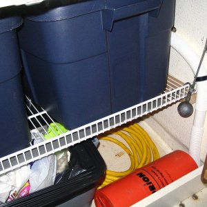 Media 'Coated wire shelving, flipped upside down and angled back toward the hull - 18 months old and no rust (yet?)' in album 'The decal my lovely wife got me for Xmas 2005.'
