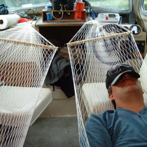 (AK Angler) Sleeping arrangements on Navicula (with a tarp secured over the cockpit)