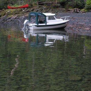 Reflections on a red canoe...