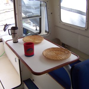 I now have a place for two people to sit on the bench seat and eat inside out of the weather.