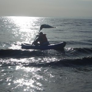 (catdogcat) Surfing 1 Ft waves in Cook Inlet.  The first wave came over the bow when I was getting off the beach.  F*** that water is cold in March!!