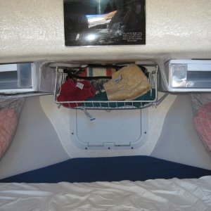 prototype storage for light stuff bungeed and taped up till tested in use, there is ample foot space