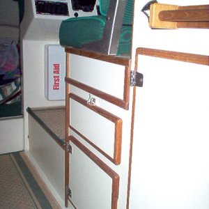Built a 4" booster for the helm seat.  Adds room for log and maps.