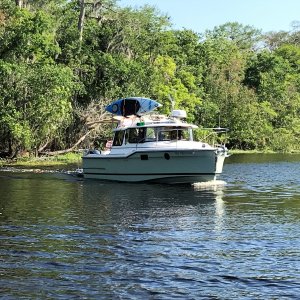 Bill on the Mystery Girl Ranger Tug, coming thru the Cut.
