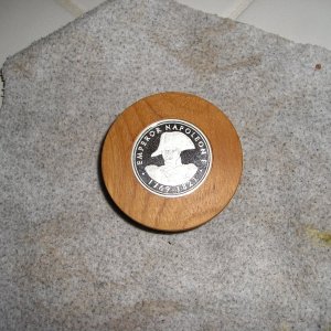 Inset coin in a teak hub made for C-Dory Napoleon