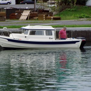 Ray at Seneca Falls in His 2005 C-22: Checking Out the Twin Suzuki's