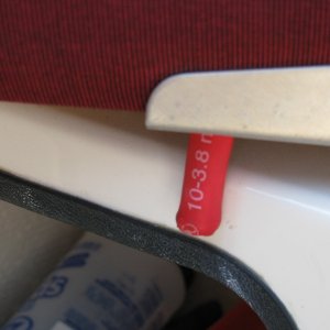 Chair Stop -- Close up of rubber coated bolt, which prevents the fiberglass from damage
