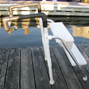Boarding Ladder close up of rear legs.  This ladder makes it easy for my wife and I to enter the boat.  The rear legs provide extra support for my 250 pound frame