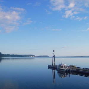 Hard to beat this kind of a morning.  SleepyC at Sequim Bay State Park. Waiting for the 10AM on shore breeze to come up.