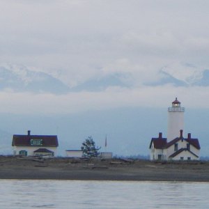 Dungeness Spit Lighthouse with Olympic Mountian backdrop