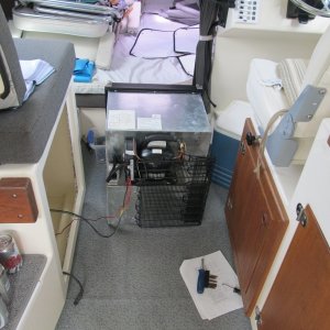 cutout mod for new fridge, DC muffin fan to left ventilates cabinet