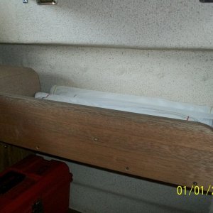 Storage shelf under dinette