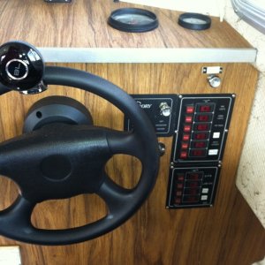 Media 'Helm with electrical panel, tach and hour meter.' in album 'Tied up at the public dock in Port Orchard.'