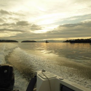 Cruising through Guemes Channel, passing a tug and barge.