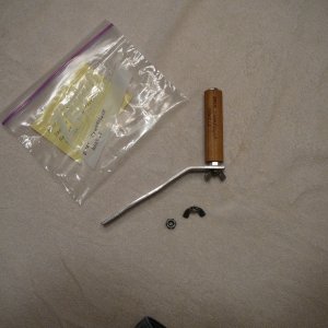 Emergency Downrigger Hangle for Scotty electric downrigger.  Used 1in wide aluminum strap, 1/8 in thick and a center drilled dowel for handle.  Wingnut allows disassemby and easy storage.